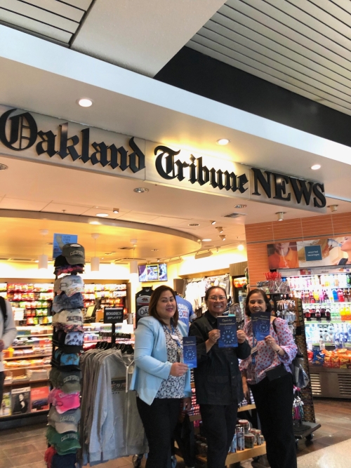 at Oakland Tribune News at Oakland International Airport, taken with managers, Lori and Jory. 